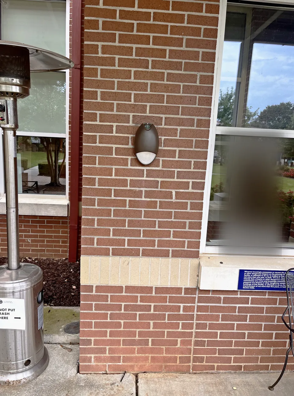 After: new LED wall pack on the same brick wall