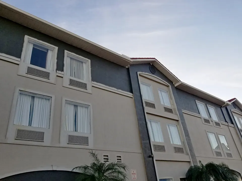 Finished: the three-story wing in gray and charcoal