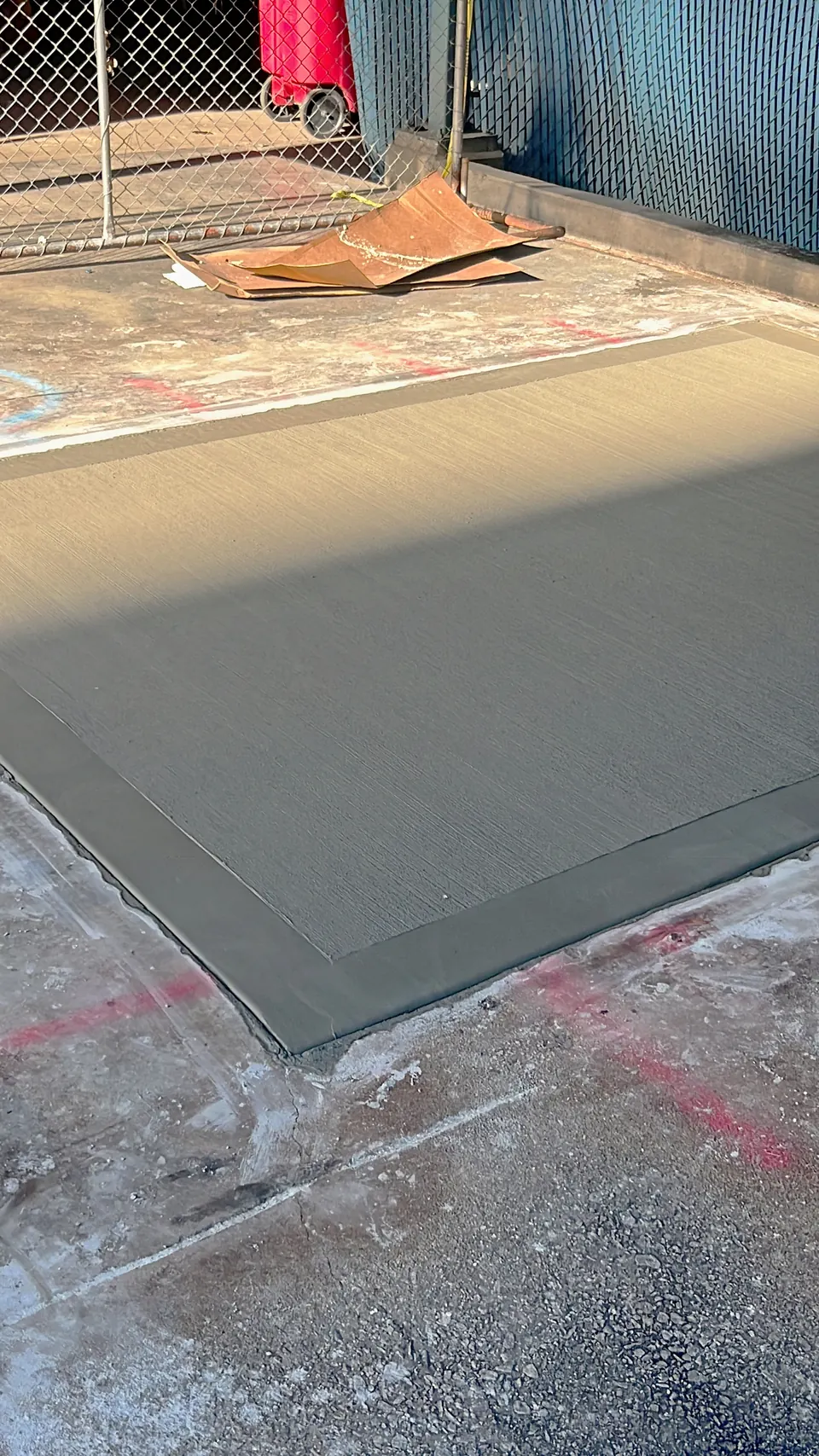 The finished broom-finish equipment pad